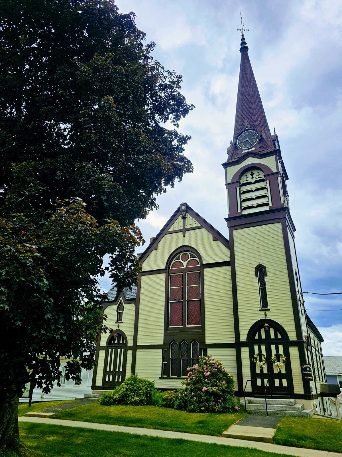 The First Parish meetinghouse with its steeple and bell tower