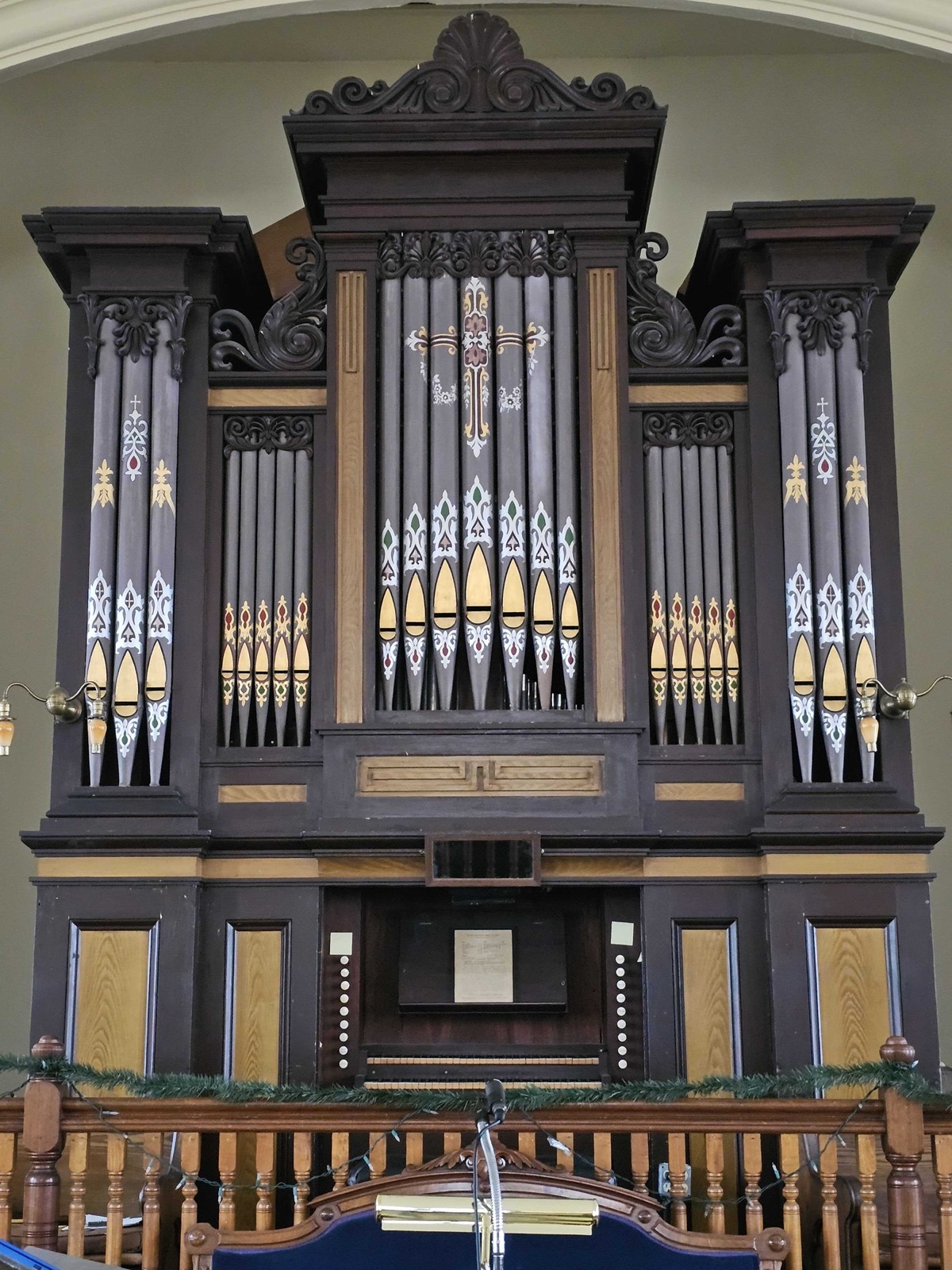 The organ pipes and console in the sanctuary